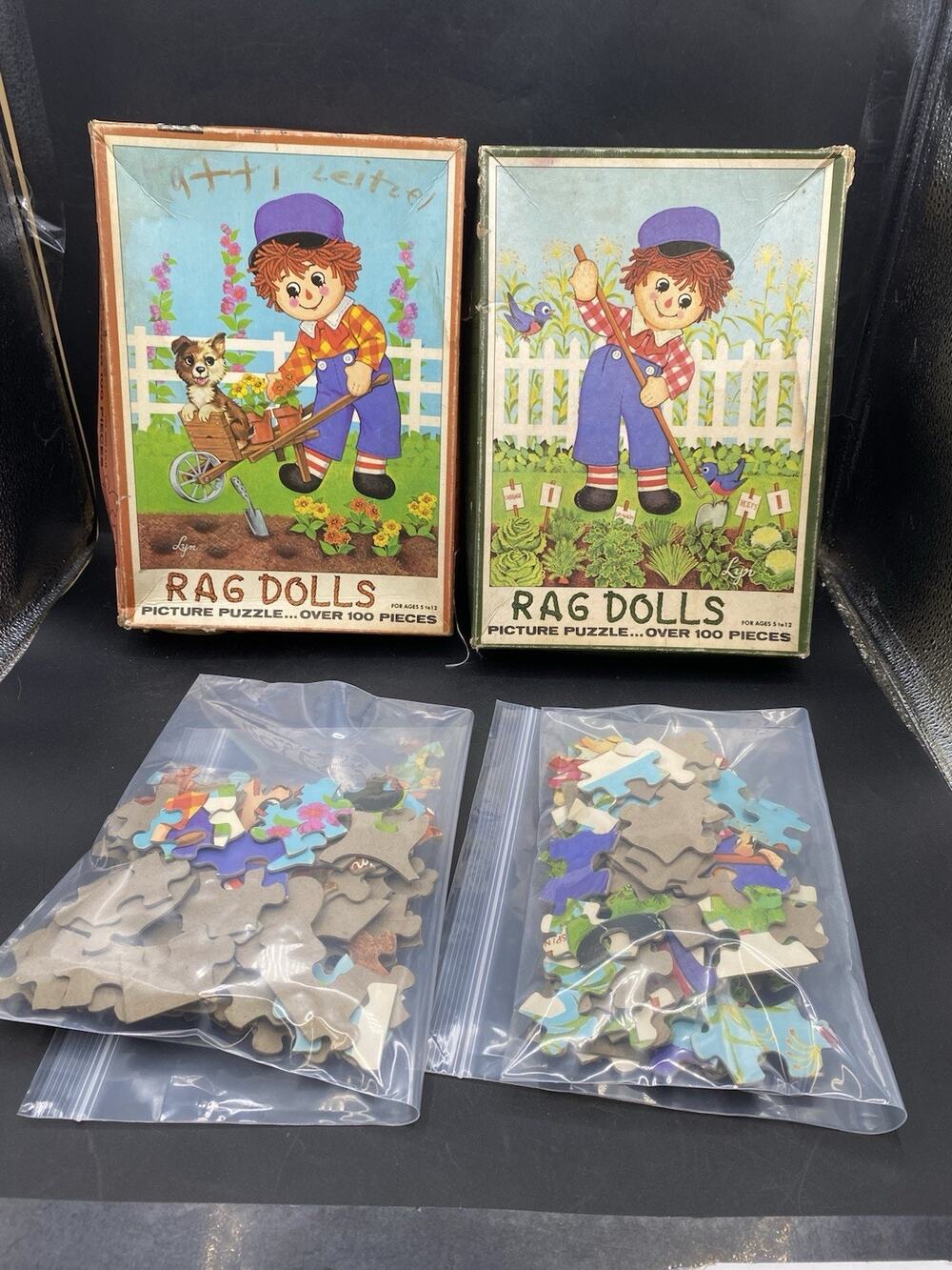 Lot Of 2 Vintage Rag Doll Puzzles , May Be Missing Piece From Puzzle Each Read